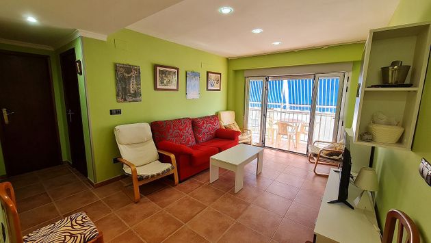 Foto 1 de Piso en venta en Oliva Playa de 3 habitaciones con terraza y calefacción