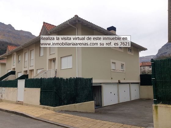 Foto 1 de Casa adossada en venda a calle Arturo Lopez de 2 habitacions amb terrassa i piscina
