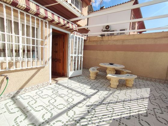 Foto 1 de Casa adossada en venda a calle Crucero Baleares de 5 habitacions amb terrassa i balcó