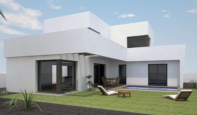 Foto 1 de Casa en venda a Tinajo de 4 habitacions amb terrassa i piscina
