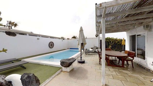 Foto 1 de Casa en venda a Charco de Palo de 4 habitacions amb terrassa i piscina