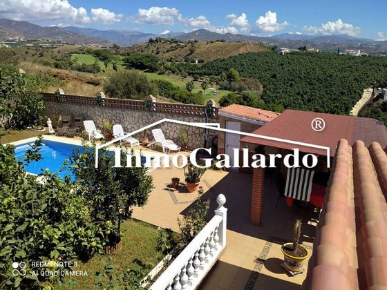 Foto 1 de Venta de casa en Caleta de Vélez de 4 habitaciones con terraza y piscina