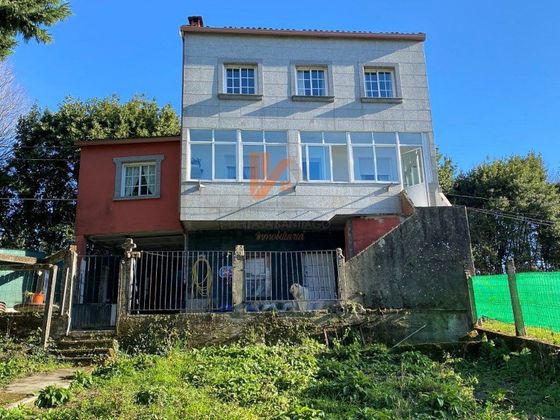 Foto 1 de Casa en venda a calle Dos Chouchiños de 4 habitacions amb jardí i calefacció