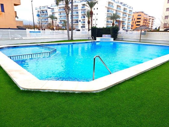 Foto 1 de Piso en venta en Daimús de 3 habitaciones con terraza y piscina