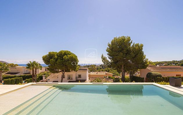 Foto 1 de Venta de chalet en Pinar del Advocat - Cometa de 6 habitaciones con terraza y piscina