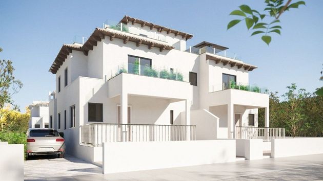 Foto 1 de Casa adossada en venda a La Marina de 2 habitacions amb terrassa i piscina