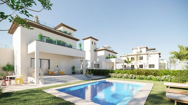 Foto 2 de Casa adossada en venda a La Marina de 2 habitacions amb terrassa i piscina