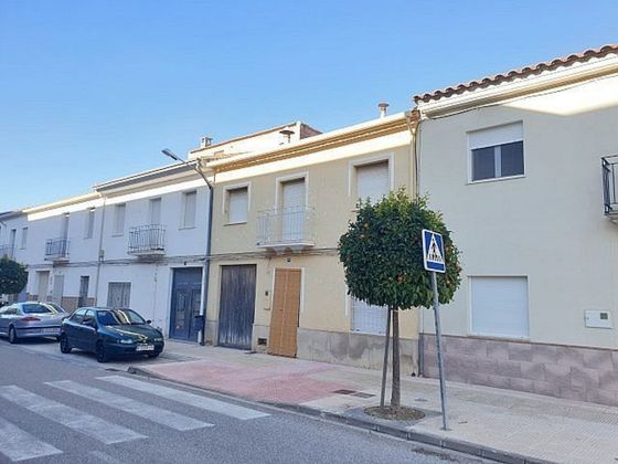 Foto 1 de Casa adosada en venta en avenida Vall D'albaida de 4 habitaciones con terraza y garaje