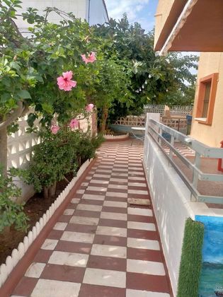 Foto 2 de Alquiler de casa adosada en El Perellonet de 3 habitaciones con terraza y piscina