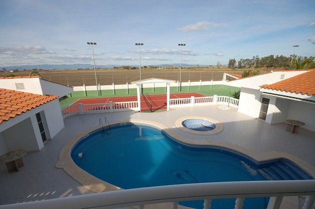 Foto 1 de Xalet en venda a calle Amposta de 7 habitacions amb terrassa i piscina