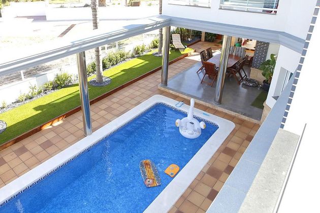 Foto 2 de Chalet en venta en Les Cases d'Alcanar de 4 habitaciones con terraza y piscina