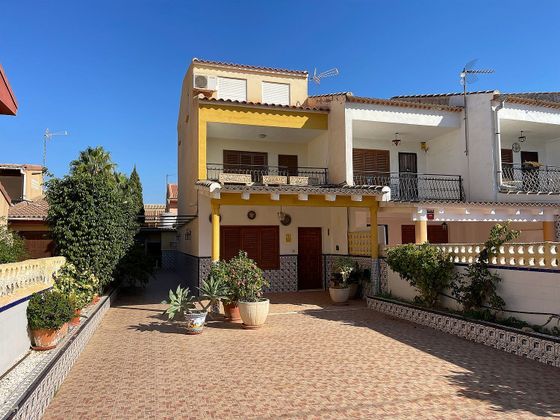 Foto 1 de Casa adosada en venta en Puerto de Mazarrón de 4 habitaciones con terraza y jardín