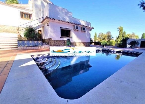 Foto 1 de Venta de chalet en El Pinar - Palacio de Congresos de 6 habitaciones con terraza y piscina