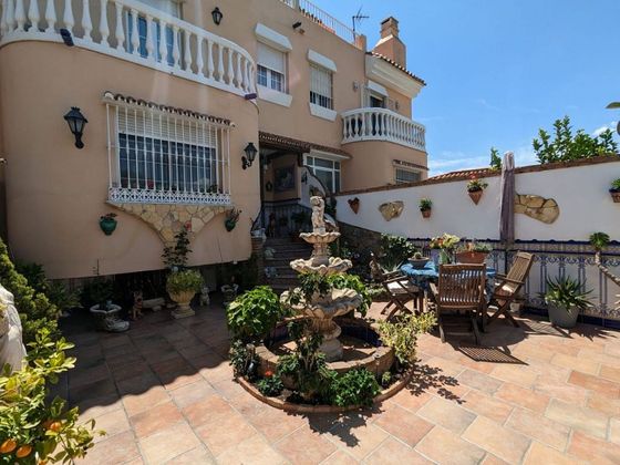 Foto 1 de Venta de casa adosada en Churriana de 3 habitaciones con terraza y piscina