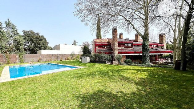 Foto 1 de Venta de chalet en Villafranca del Castillo de 7 habitaciones con terraza y piscina