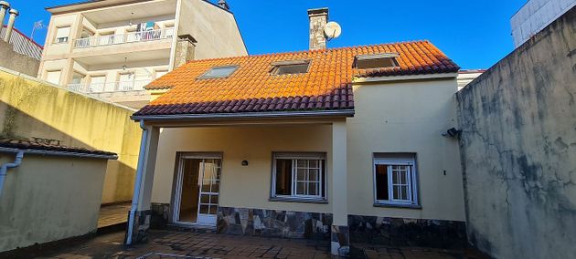 Foto 1 de Casa adossada en venda a Estrada (A) de 5 habitacions amb terrassa i garatge