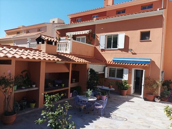 Foto 1 de Casa adossada en venda a Racó de 4 habitacions amb terrassa i piscina