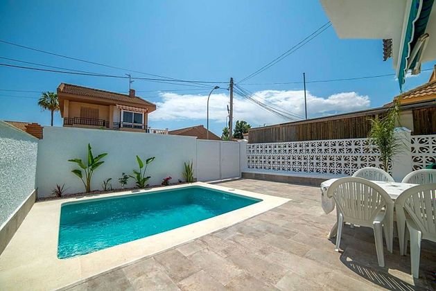 Foto 1 de Xalet en venda a Santiago de la Ribera de 4 habitacions amb terrassa i piscina