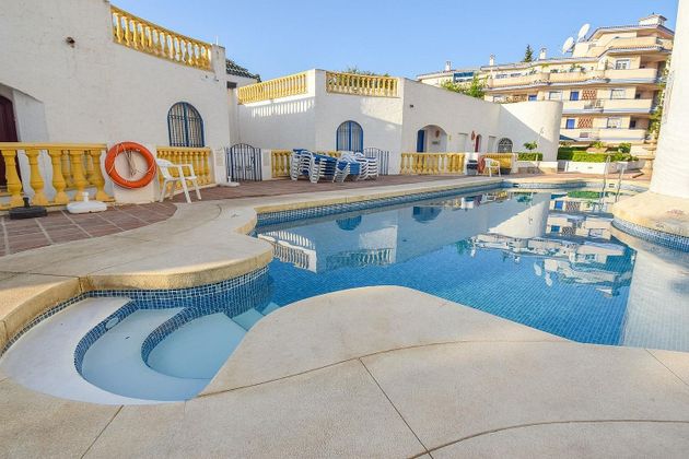 Foto 1 de Piso en venta en Mijas Golf de 2 habitaciones con terraza y piscina