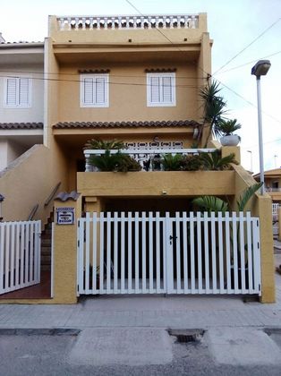 Foto 1 de Casa adossada en venda a El Perelló - Les Palmeres - Mareny de Barraquetes de 5 habitacions amb terrassa i piscina