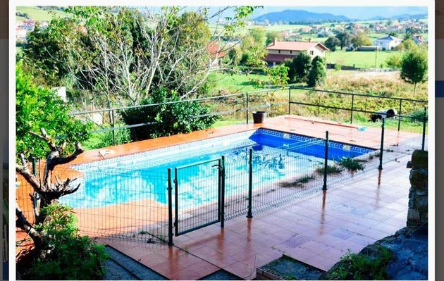Foto 2 de Venta de chalet en Meruelo de 7 habitaciones con terraza y piscina