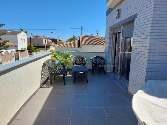 Foto 1 de Casa adosada en alquiler en Oliva pueblo de 3 habitaciones con terraza y piscina