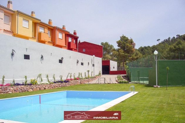 Foto 1 de Casa adossada en venda a Náquera de 3 habitacions amb terrassa i piscina
