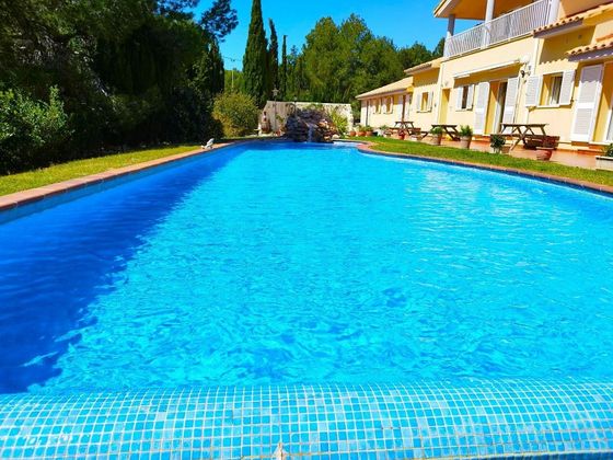 Foto 1 de Chalet en venta en Les Tres Cales de 7 habitaciones con terraza y piscina