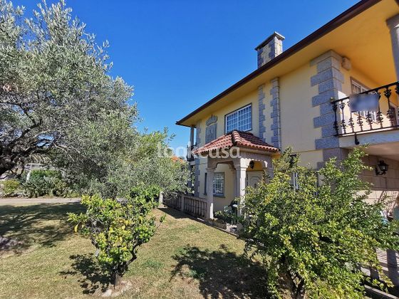 Foto 2 de Chalet en venta en Adina-Portonovo de 8 habitaciones con terraza y garaje