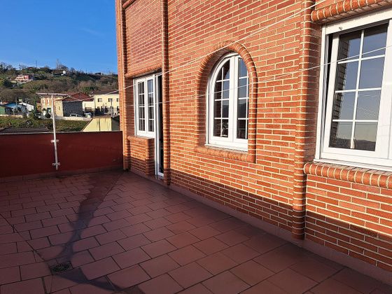 Foto 1 de Casa adossada en venda a La Felguera de 6 habitacions amb terrassa i garatge