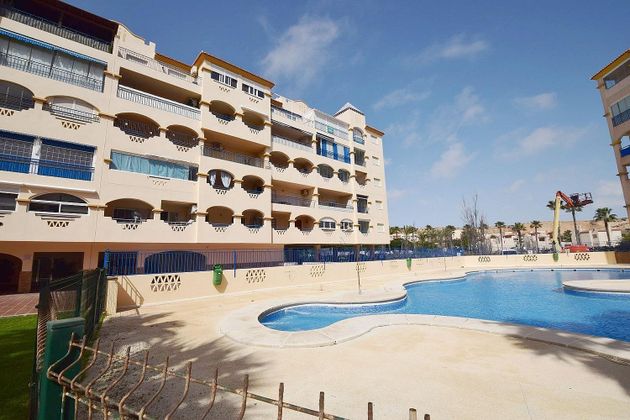 Foto 1 de Piso en venta en Almerimar - Balerma - San Agustín - Costa de Ejido de 1 habitación con terraza y piscina