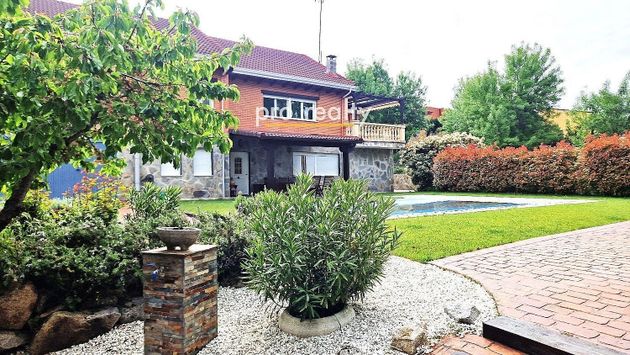 Foto 1 de Venta de chalet en Colmenarejo de 5 habitaciones con terraza y piscina