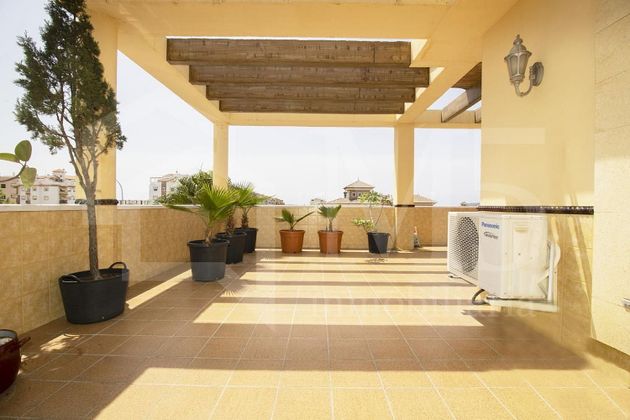 Foto 1 de Casa adossada en venda a Camino Viejo de Málaga de 4 habitacions amb terrassa i piscina