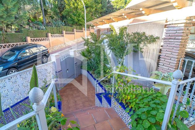 Foto 2 de Venta de casa adosada en Caleta de Vélez de 4 habitaciones con terraza y piscina