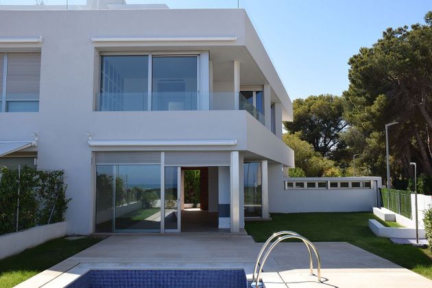 Foto 2 de Casa adossada en venda a calle Del Camí de L'atall de 3 habitacions amb terrassa i piscina