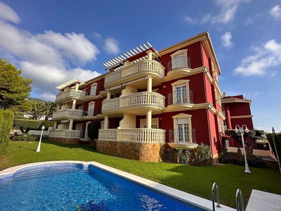 Foto 1 de Piso en venta en calle L'atall Zona Ribamar de 2 habitaciones con terraza y piscina