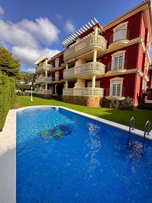Foto 2 de Piso en venta en calle L'atall Zona Ribamar de 2 habitaciones con terraza y piscina