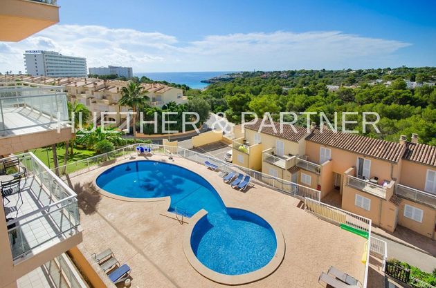Foto 1 de Piso en venta en Cales de Mallorca de 3 habitaciones con terraza y piscina