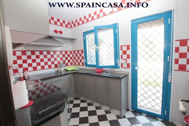 Foto 2 de Venta de casa en Cartaya de 5 habitaciones con piscina y garaje