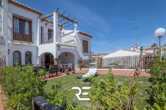 Foto 2 de Venta de casa adosada en Arenal de 4 habitaciones con terraza y piscina