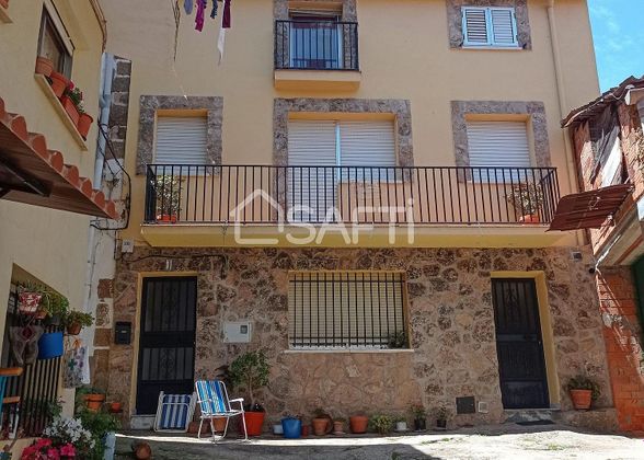 Foto 1 de Casa adossada en venda a Torre de Don Miguel de 4 habitacions amb terrassa i piscina