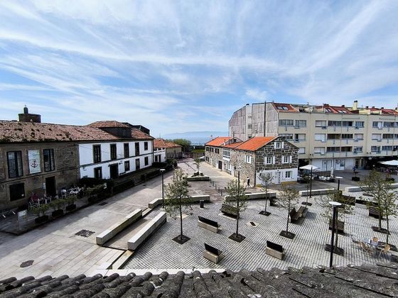 Foto 1 de Venta de casa en Porto do Son de 4 habitaciones con jardín y balcón