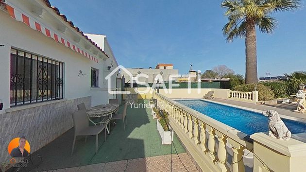 Foto 2 de Chalet en venta en Palma de Gandía de 3 habitaciones con terraza y piscina