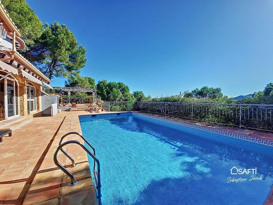 Foto 2 de Xalet en venda a Beniarjó de 5 habitacions amb piscina i jardí