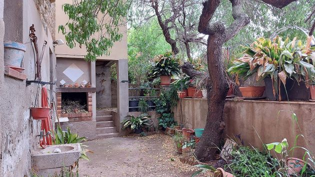 Foto 1 de Casa adosada en venta en Ossó de Sió de 4 habitaciones con garaje y jardín