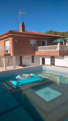 Foto 1 de Chalet en venta en urbanización Pins Manous de 4 habitaciones con terraza y piscina