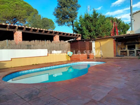 Foto 2 de Casa adossada en venda a Santa Coloma de Farners de 3 habitacions amb terrassa i piscina