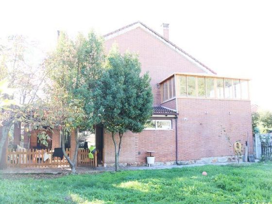Foto 1 de Casa adossada en venda a Collado Mediano de 5 habitacions amb terrassa i piscina
