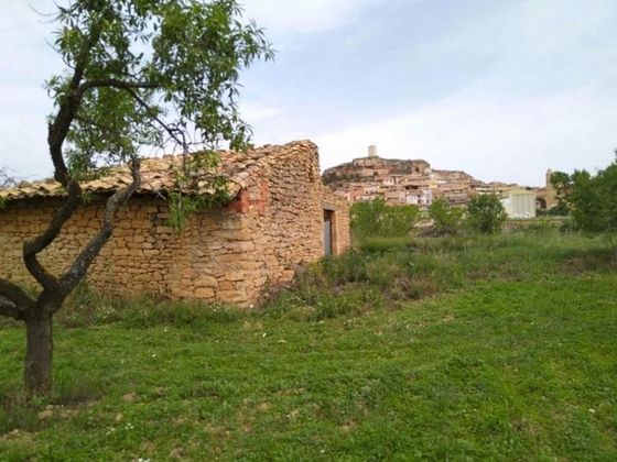 Foto 1 de Casa rural en venda a Monroyo de 1 habitació amb jardí