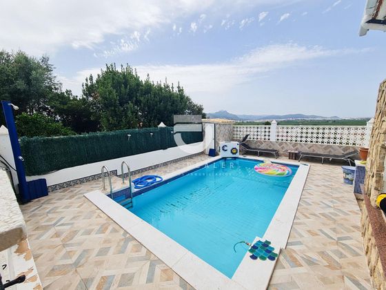 Foto 1 de Venta de chalet en Rafelcofer de 4 habitaciones con terraza y piscina